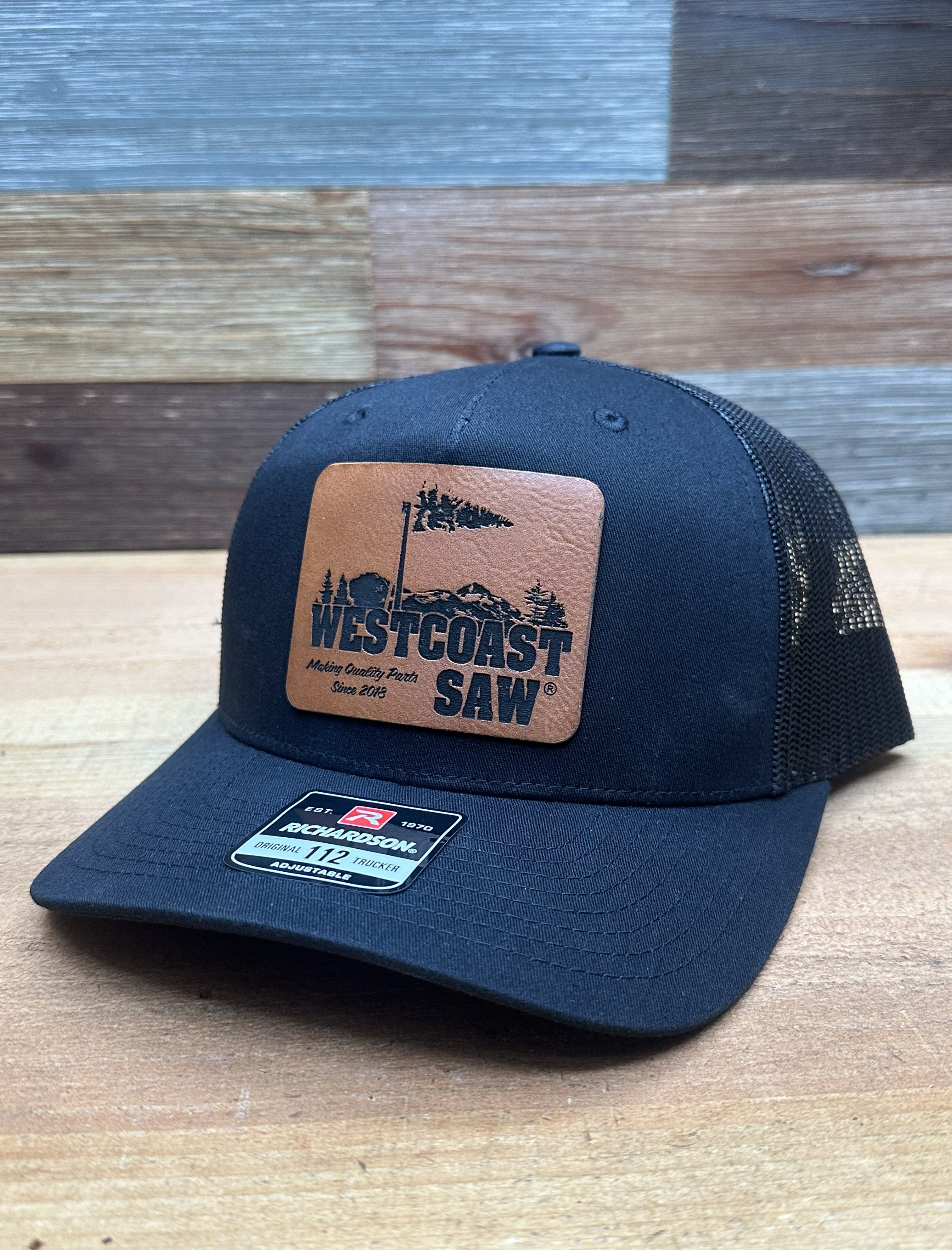Westcoast Saw Tree Climber Trucker Hat
